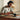a worker enjoying their productive and practical home office layout as they work meditatively