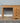 A wooden farmhouse dressing table with three drawers